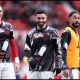 MANCHESTER, ENGLAND - MARCH 01: Diogo Dalot, Bruno Fernandes and Matheus Cunha of Manchester United warm up prior to the Premier League match between Manchester United and Crystal Palace at Old Trafford on March 01, 2026 in Manchester, England.