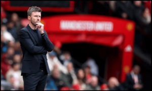 MANCHESTER, ENGLAND - MAY 03: Michael Carrick, Manager of Manchester United, reacts during the Premier League match between Manchester United and Liverpool at Old Trafford on May 03, 2026 in Manchester, England.