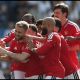 BRIGHTON, ENGLAND - MAY 24: Bruno Fernandes of Manchester United celebrates scoring his team's third goal with teammates during the Premier League match between Brighton & Hove Albion and Manchester United at the Amex Stadium on May 24, 2026 in Brighton, England.