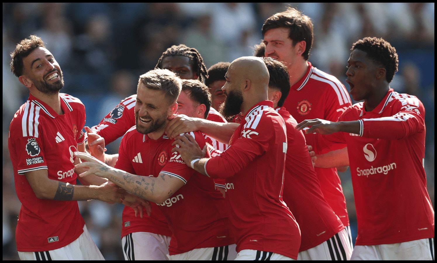 BRIGHTON, ENGLAND - MAY 24: Bruno Fernandes of Manchester United celebrates scoring his team's third goal with teammates during the Premier League match between Brighton & Hove Albion and Manchester United at the Amex Stadium on May 24, 2026 in Brighton, England.
