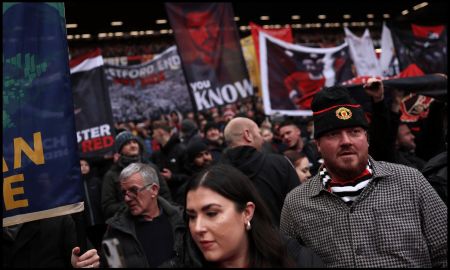 MANCHESTER, ENGLAND - MARCH 15: Fans of Manchester United show their support prior to the Premier League match between Manchester United and Aston Villa at Old Trafford on March 15, 2026 in Manchester, England.