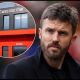 Michael Carrick looks on from the touchline.