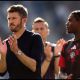 BRIGHTON, ENGLAND - MAY 24: Michael Carrick, Manager of Manchester United, applauds the fans after the Premier League match between Brighton & Hove Albion and Manchester United at the Amex Stadium on May 24, 2026 in Brighton, England.