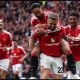 MANCHESTER, ENGLAND - MAY 17: Luke Shaw of Manchester United celebrates scoring his team's first goal with teammates Matheus Cunha and Amad Diallo during the Premier League match between Manchester United and Nottingham Forest at Old Trafford on May 17, 2026 in Manchester, England.