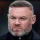 MILAN, ITALY - MAY 06: Former professional footballer and current TV Pundit, Wayne Rooney looks on prior to the UEFA Champions League 2024/25 Semi Final Second Leg match between FC Internazionale Milano and FC Barcelona at Giuseppe Meazza Stadium on May 06, 2025 in Milan, Italy.