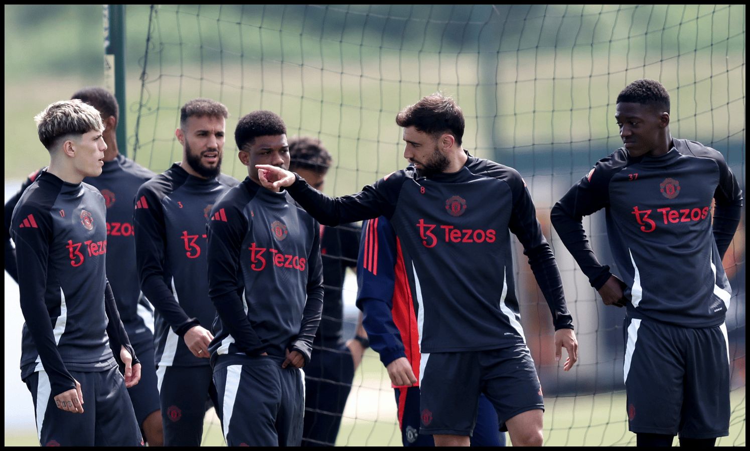 MANCHESTER, ENGLAND - MAY 14: Bruno Fernandes of Manchester United speaks to his teammates during a training session at Carrington Training Ground on May 14, 2025 in Manchester, England.
