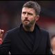 MANCHESTER, ENGLAND - FEBRUARY 07: Michael Carrick, Manager of Manchester United, celebrates victory during the Premier League match between Manchester United and Tottenham Hotspur at Old Trafford on February 07, 2026 in Manchester, England.
