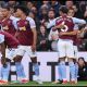 BIRMINGHAM, ENGLAND - MAY 13: Youri Tielemans of Aston Villa celebrates scoring his team's first goal with teammate Douglas Luiz during the Premier League match between Aston Villa and Liverpool FC at Villa Park on May 13, 2024 in Birmingham, England.
