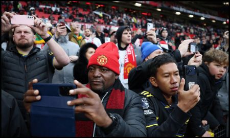 MANCHESTER, ENGLAND - FEBRUARY 07: Fans of Manchester United look on inside the stadium prior to the Premier League match between Manchester United and Tottenham Hotspur at Old Trafford on February 07, 2026 in Manchester, England.