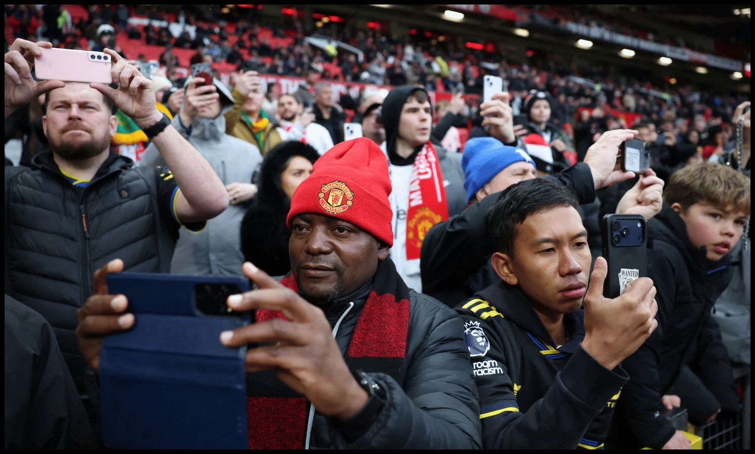 MANCHESTER, ENGLAND - FEBRUARY 07: Fans of Manchester United look on inside the stadium prior to the Premier League match between Manchester United and Tottenham Hotspur at Old Trafford on February 07, 2026 in Manchester, England.