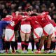 MANCHESTER, ENGLAND - DECEMBER 30: Manchester United players create a huddle prior to the Premier League match between Manchester United FC and Newcastle United FC at Old Trafford on December 30, 2024 in Manchester, England.