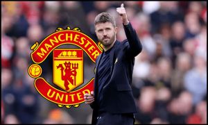 MANCHESTER, ENGLAND - MAY 17: Michael Carrick, Manager of Manchester United, speaks to the fans following the Premier League match between Manchester United and Nottingham Forest at Old Trafford on May 17, 2026 in Manchester, England.
