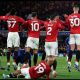 Man Utd's defensive wall jumping while Cole Palmers converts a free-kick for Chelsea