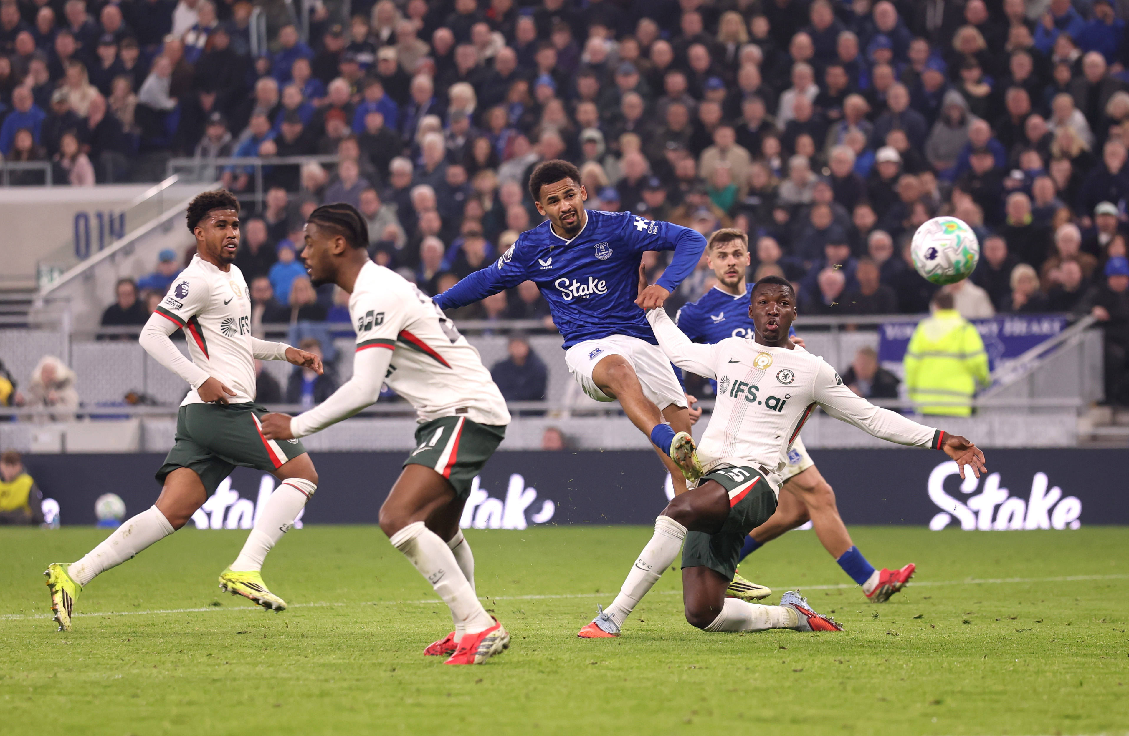 Iliman Ndiaye takes a shot while in action for Everton.