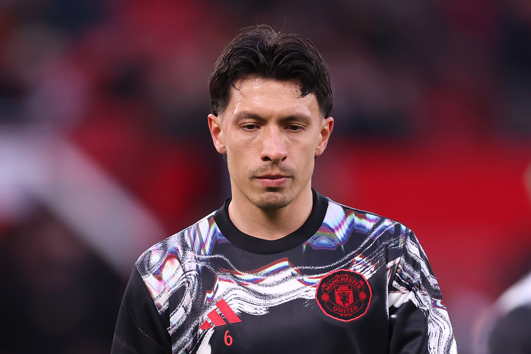 MANCHESTER, ENGLAND - APRIL 13: Lisandro Martinez of Manchester United warms up prior to the Premier League match between Manchester United and Leeds United at Old Trafford on April 13, 2026 in Manchester, England