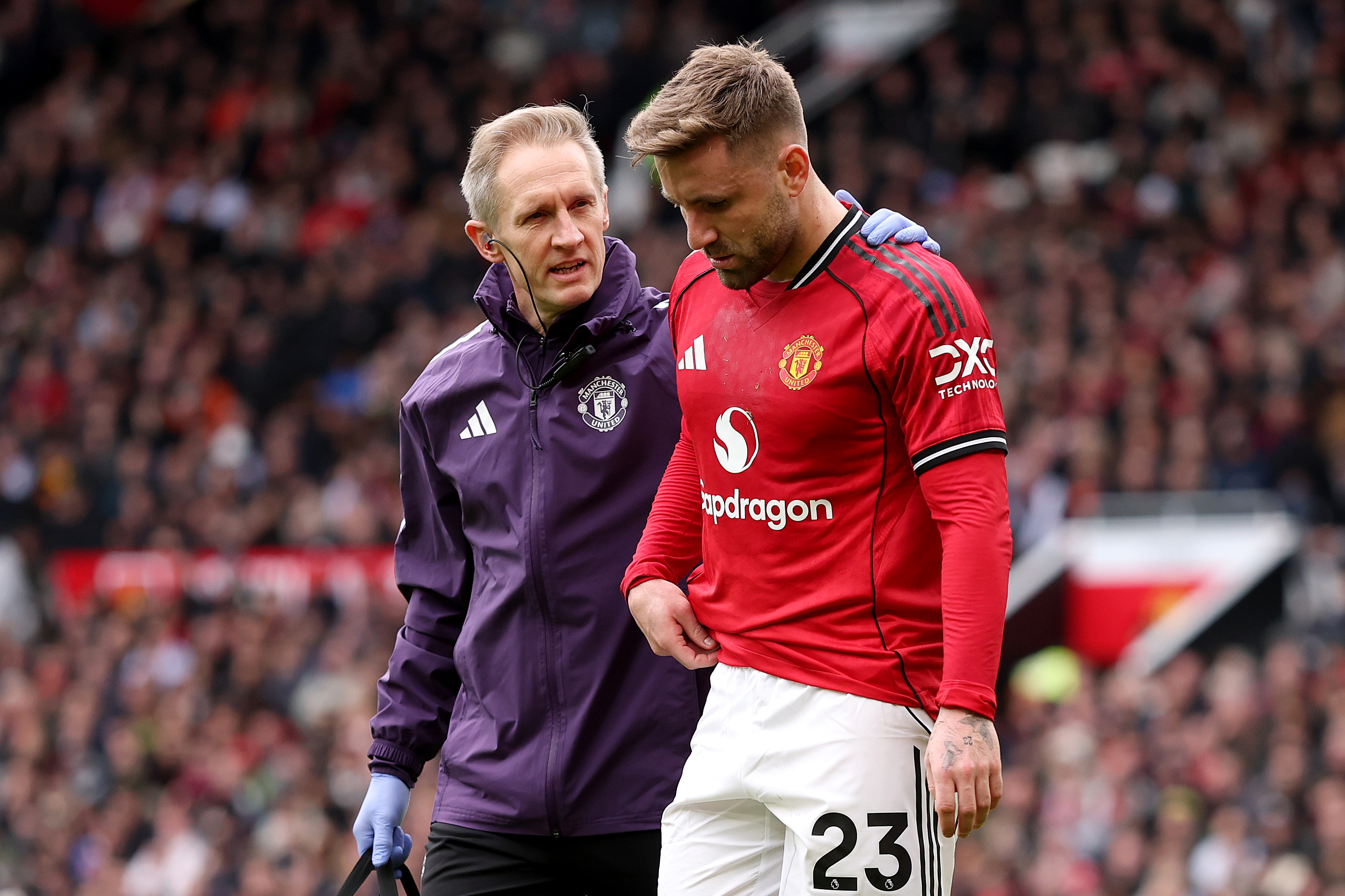MANCHESTER, ENGLAND - MARCH 01: Luke Shaw of Manchester United looks dejected as he leaves the pitch after being substituted after picking up an injury during the Premier League match between Manchester United and Crystal Palace at Old Trafford on March 01, 2026 in Manchester, England. 