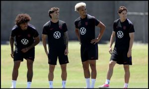 IRVINE, CALIFORNIA - JUNE 22: (L-R) Chris Richards, Christian Pulisic, Antonee Robinson and Brenden Aaronson of the United States participate during a training session at Great Park Sports Complex on June 22, 2026 in Irvine, California.