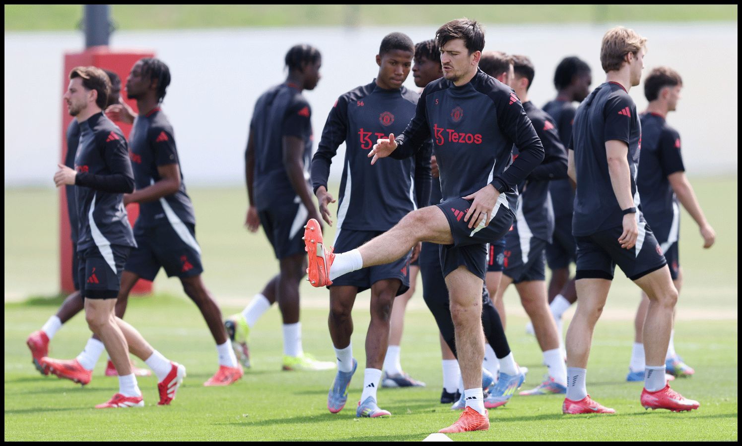 MANCHESTER, ENGLAND - MAY 14: Harry Maguire of Manchester United warms up during a training session at Carrington Training Ground on May 14, 2025 in Manchester, England.
