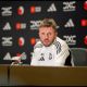 Michael Carrick talks at a press conference