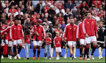 MANCHESTER, ENGLAND - AUGUST 30: Harry Maguire of Manchester United walks out onto the pitch with teammates before the Premier League 2026/27 match between Manchester United and Ipswich Town at Old Trafford on August 30, 2026 in Manchester, England.