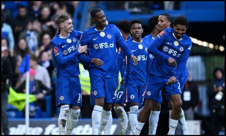 Tosin Adarabioyo celebrating with Chelsea teammates