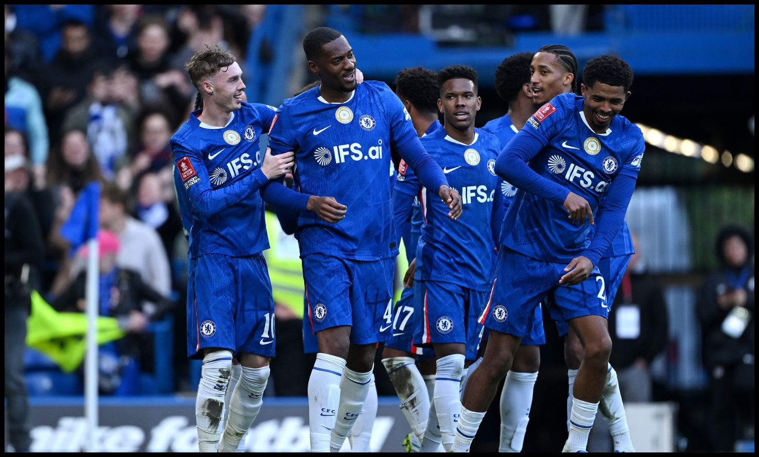 Tosin Adarabioyo celebrating with Chelsea teammates