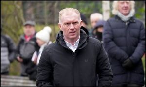 Paul Scholes looking on