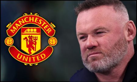 Wayne Rooney looking on