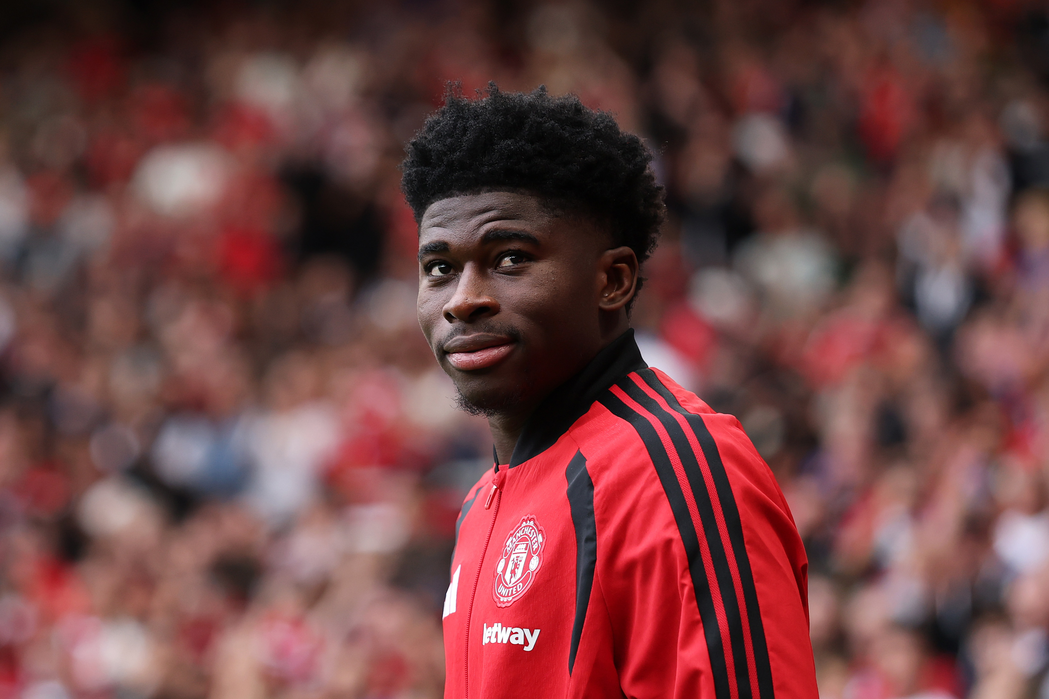 MANCHESTER, ENGLAND - AUGUST 30: New signing Carlos Baleba of Manchester United is introduced before the Premier League 2026/27 match between Manchester United and Ipswich Town at Old Trafford on August 30, 2026 in Manchester, England. (Photo by Dan Mullan/Getty Images)