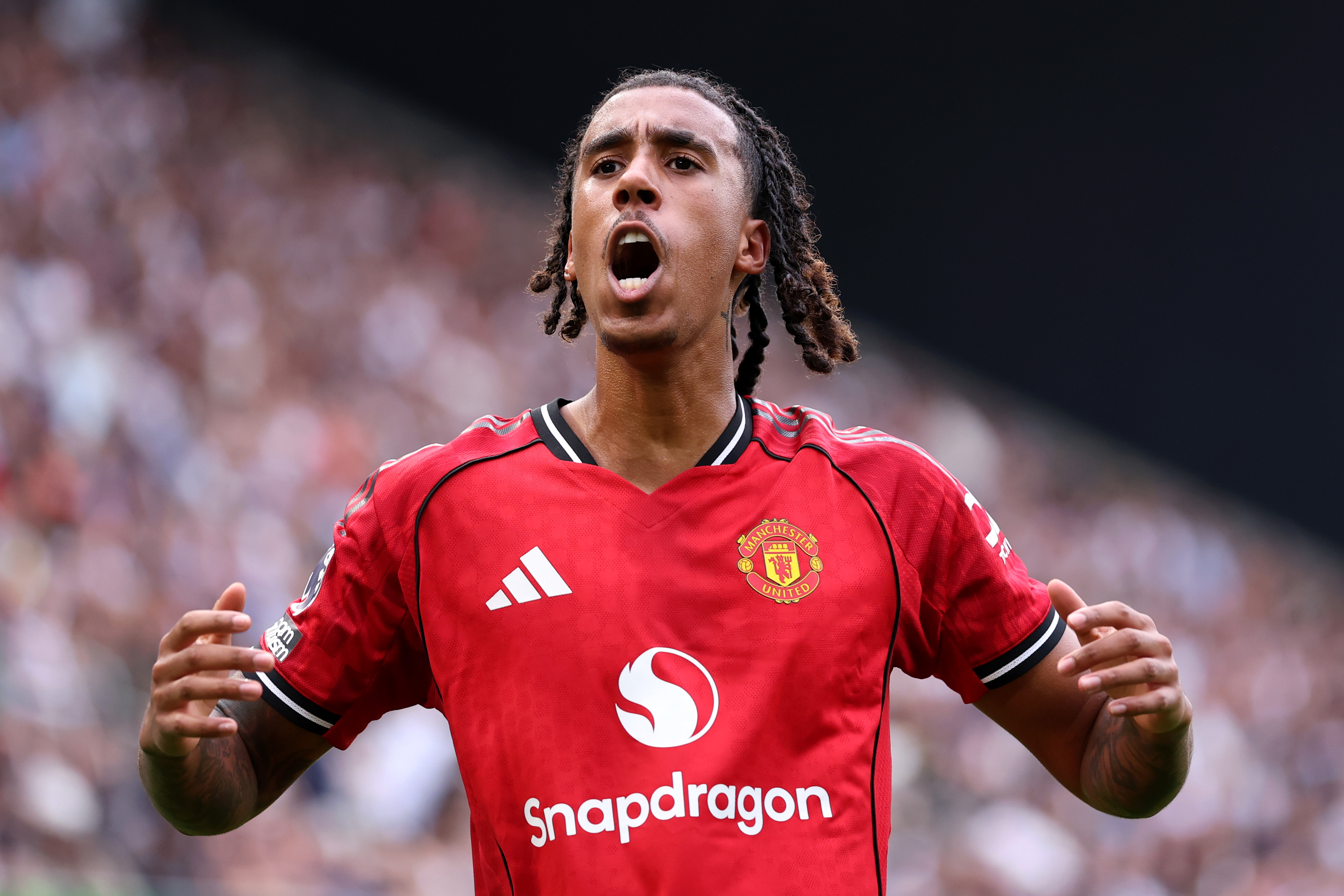 LONDON, ENGLAND - AUGUST 24: Leny Yoro of Manchester United celebrates his team's first goal, an own goal by Rodigo Muniz of Fulham (not pictured), during the Premier League match between Fulham and Manchester United at Craven Cottage on August 24, 2025 in London, England. (Photo by Justin Setterfield/Getty Images)
