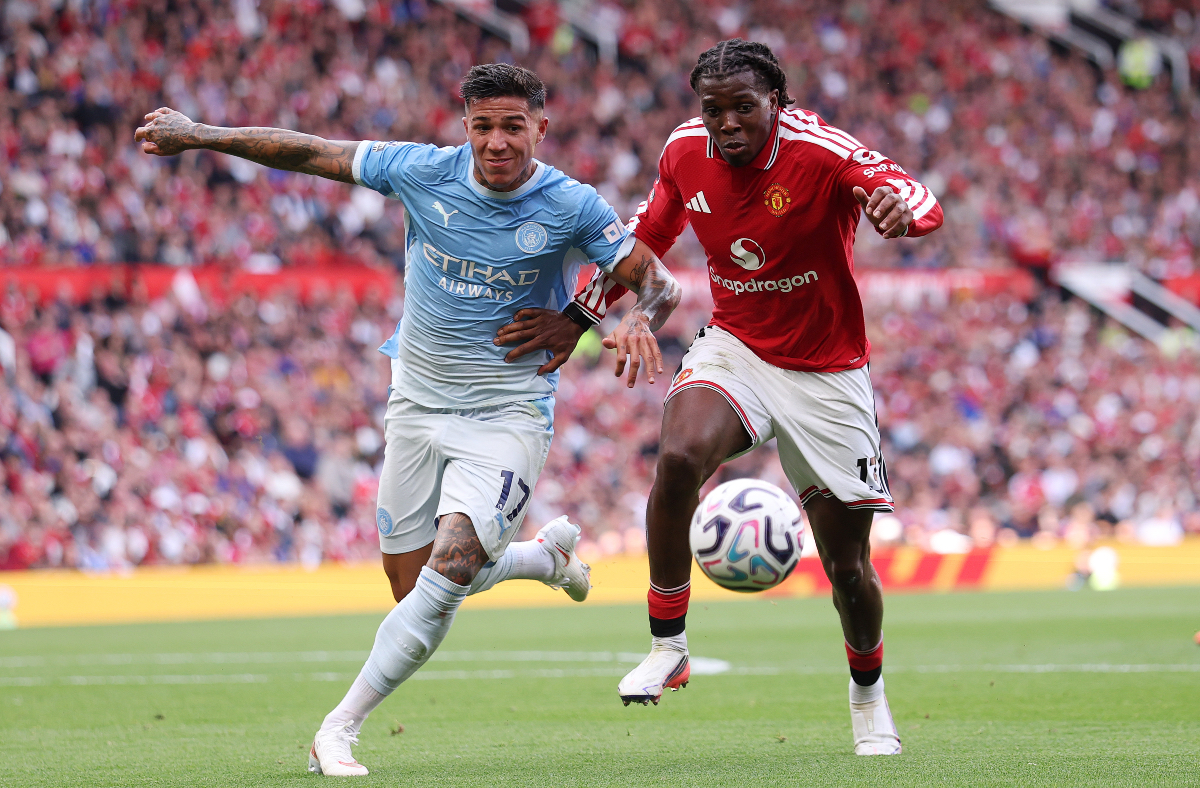 MANCHESTER, ENGLAND - SEPTEMBER 13: Patrick Chinazaekpere Dorgu of Manchester United is challenged by Enzo Fernandez of Manchester City during the Premier League 2026/27 match between Manchester United and Manchester City at Old Trafford on September 13, 2026 in Manchester, England. (Photo by Carl Recine/Getty Images)