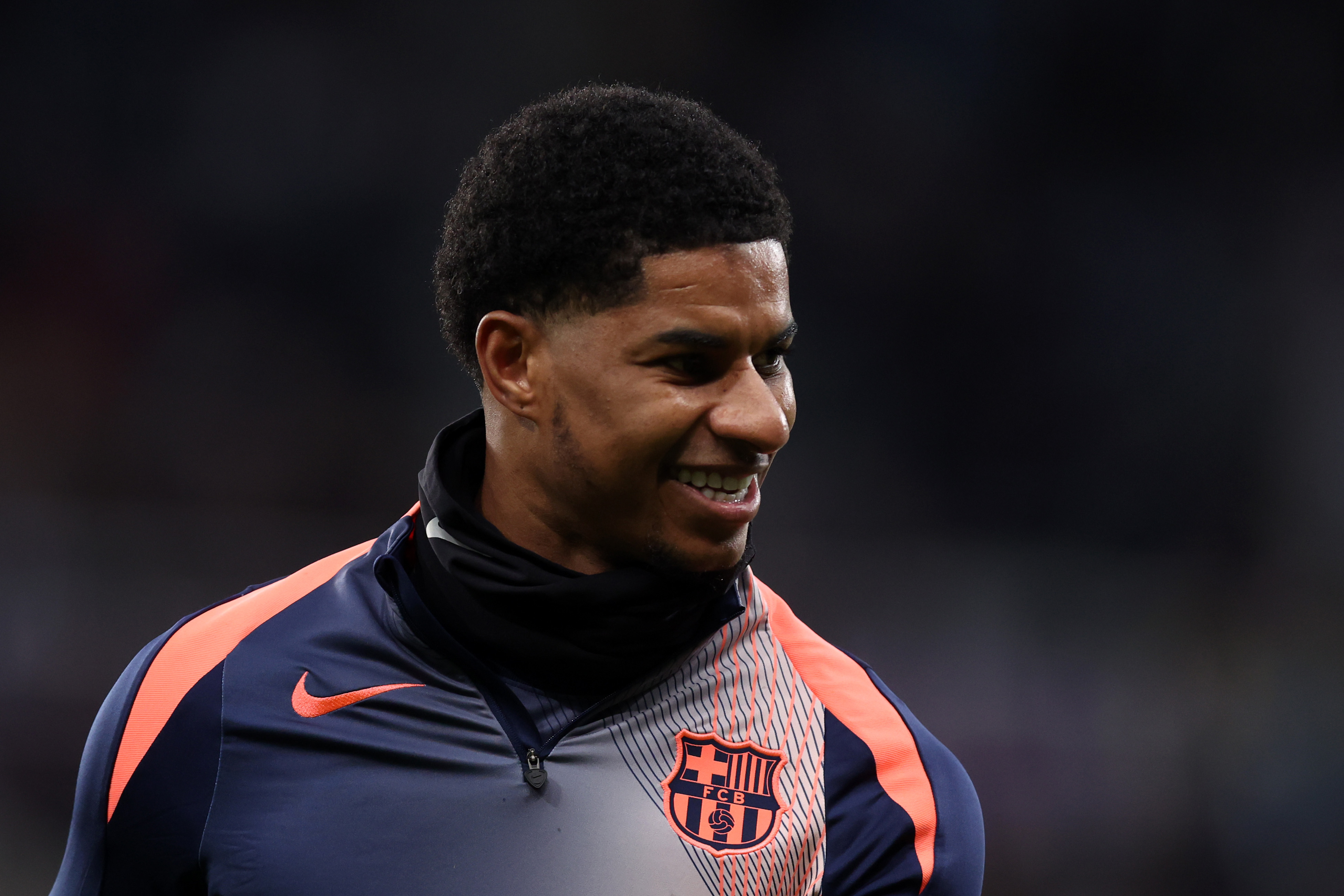 NEWCASTLE UPON TYNE, ENGLAND - MARCH 10: Marcus Rashford of FC Barcelona warms up prior to the UEFA Champions League 2025/26 Round of 16 First Leg match between Newcastle United FC and FC Barcelona at St James' Park on March 10, 2026 in Newcastle upon Tyne, England. (Photo by George Wood/Getty Images)