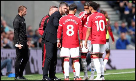 LIVERPOOL, ENGLAND - SEPTEMBER 06: Michael Carrick, Manager of Manchester United, speaks with his players during a break in play in the Premier League 2026/27 match between Everton and Manchester United at Hill Dickinson Stadium on September 06, 2026 in Liverpool, England.
