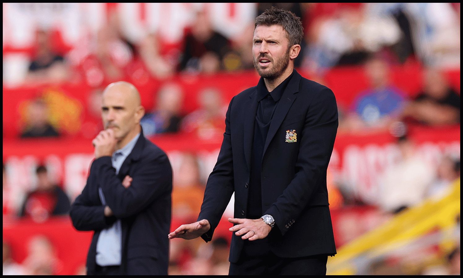 MANCHESTER, ENGLAND - SEPTEMBER 13: Michael Carrick, Manager of Manchester United, gestures during the Premier League 2026/27 match between Manchester United and Manchester City at Old Trafford on September 13, 2026 in Manchester, England