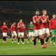 MANCHESTER, ENGLAND - MARCH 09: Bruno Fernandes and Rasmus Hojlund of Manchester United applaud the fans after the draw during the Premier League match between Manchester United FC and Arsenal FC at Old Trafford on March 09, 2025 in Manchester, England.
