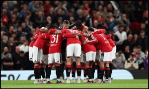 MANCHESTER, ENGLAND - SEPTEMBER 16: Manchester United players huddle before the Carabao Cup Third Round match between Manchester United and Brighton & Hove Albion at Old Trafford on September 16, 2026 in Manchester, England.