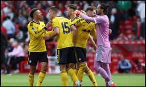 NOTTINGHAM, ENGLAND - AUGUST 22: (L-R) Ethan Ampadu, Jaka Bijol, Joe Rodon and James Trafford of Leeds United celebrate at full-time following victory in the Premier League 2026/27 match between Nottingham Forest FC and Leeds United at City Ground on August 22, 2026 in Nottingham, England.