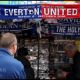 LIVERPOOL, ENGLAND - SEPTEMBER 06: Fans look at merchandise outside the stadium before the Premier League 2026/27 match between Everton and Manchester United at Hill Dickinson Stadium on September 06, 2026 in Liverpool, England.