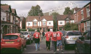 MANCHESTER, ENGLAND - SEPTEMBER 13: Fans of Manchester United arrive at the stadium before the Premier League 2026/27 match between Manchester United and Manchester City at Old Trafford on September 13, 2026 in Manchester, England.