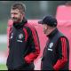 MANCHESTER, ENGLAND - OCTOBER 12: Michael Carrick, Manager of Manchester United, talks with Steve Holland, Assistant Coach of Manchester United during the training session ahead of the UEFA Champions League 2026/27 League Phase MD2 at Carrington Training Ground on October 12, 2026 in Manchester, England.