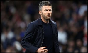 MANCHESTER, ENGLAND - OCTOBER 10: Michael Carrick, Manager of Manchester United, reacts during the Premier League 2026/27 match between Manchester United and Tottenham Hotspur at Old Trafford on October 10, 2026 in Manchester, England.