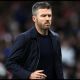 MANCHESTER, ENGLAND - OCTOBER 10: Michael Carrick, Manager of Manchester United, reacts during the Premier League 2026/27 match between Manchester United and Tottenham Hotspur at Old Trafford on October 10, 2026 in Manchester, England.