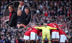 MANCHESTER, ENGLAND - OCTOBER 10: Manchester United players enter a huddle before the Premier League 2026/27 match between Manchester United and Tottenham Hotspur at Old Trafford on October 10, 2026 in Manchester, England.