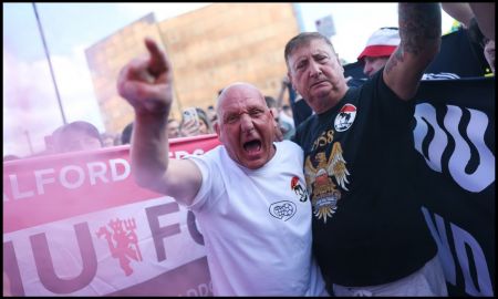 Angry Manchester United supporters protesting against the club's hierarchy